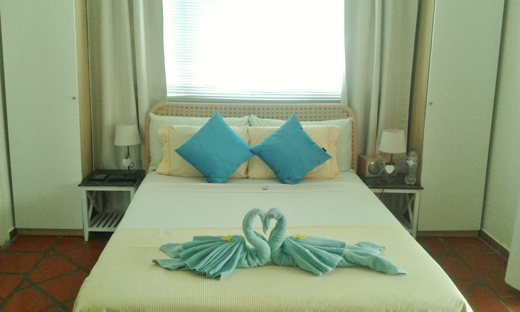 Karibu Aruba Boutique Hotel Palm Beach Bilik gambar